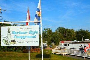 Image of Harbour Light Campground welcome sign.
